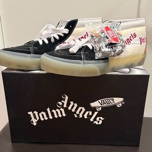 Vans Black and White High-Top Sneakers